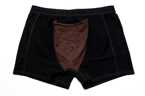 Inside view of chalk boxers featuring the inside pouch in a different colour tone and the instructions phrase "your junk goes here"
